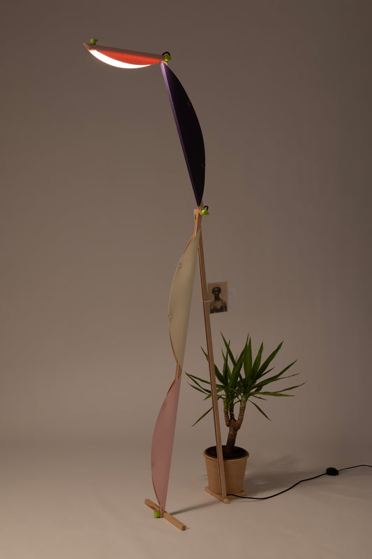 A floor lamp with HALFMOON add-ons and shade & CLIP add-ons