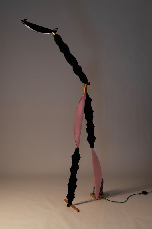 A floor lamp with HALFMOON add-ons and shade & BLIP add-on & DIP add-ons