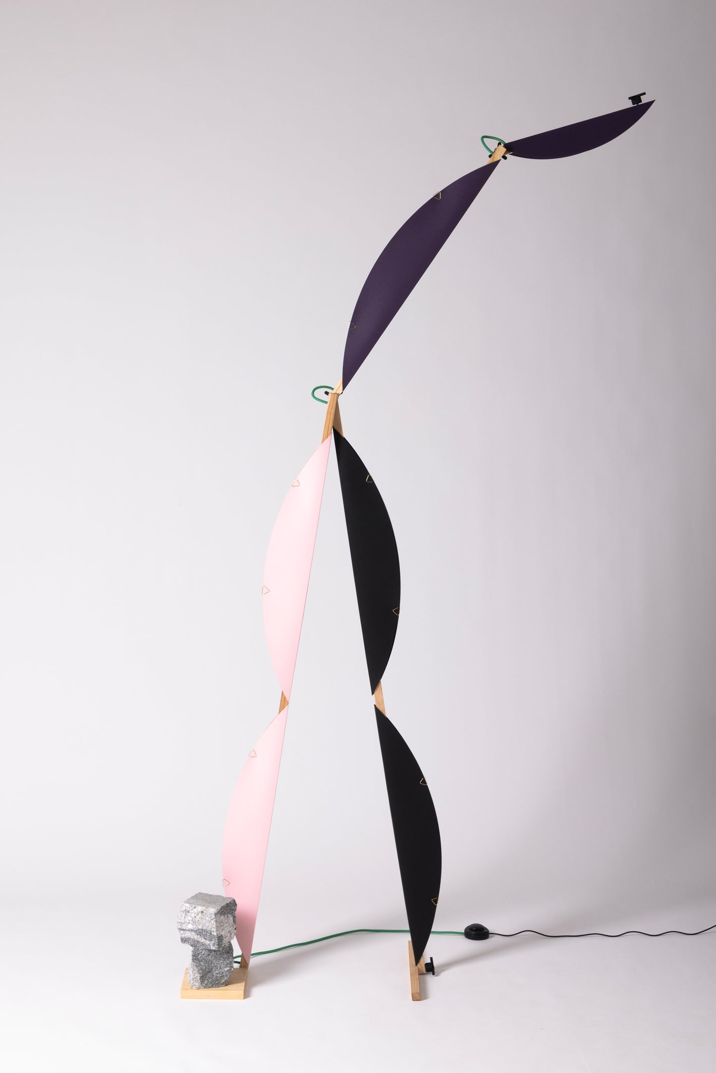 A floor lamp with HALFMOON add-ons
