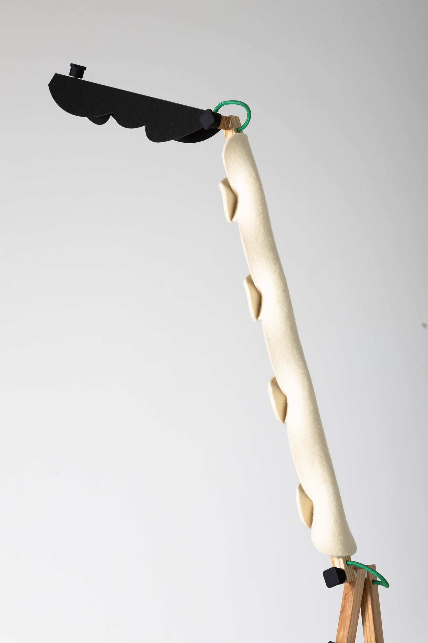 A floor lamp with OLOP sleeve & BLIP add-on and shade