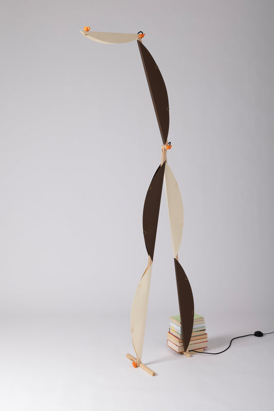 A floor lamp with HALFMOON shade and add-ons
