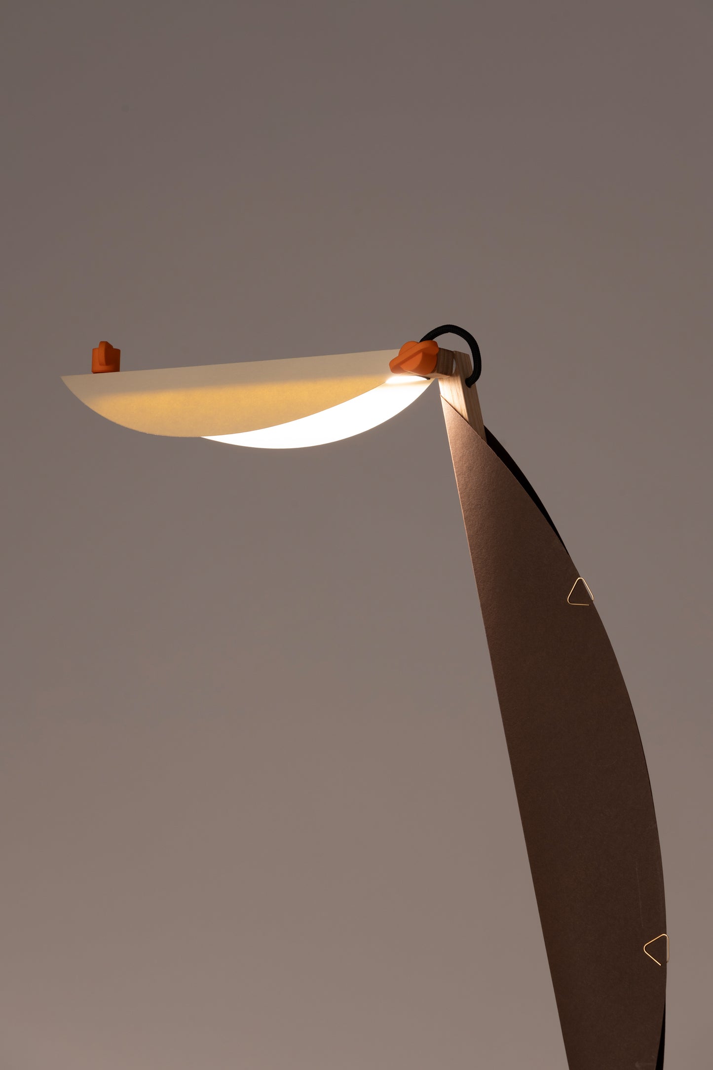 A floor lamp with HALFMOON shade and add-ons