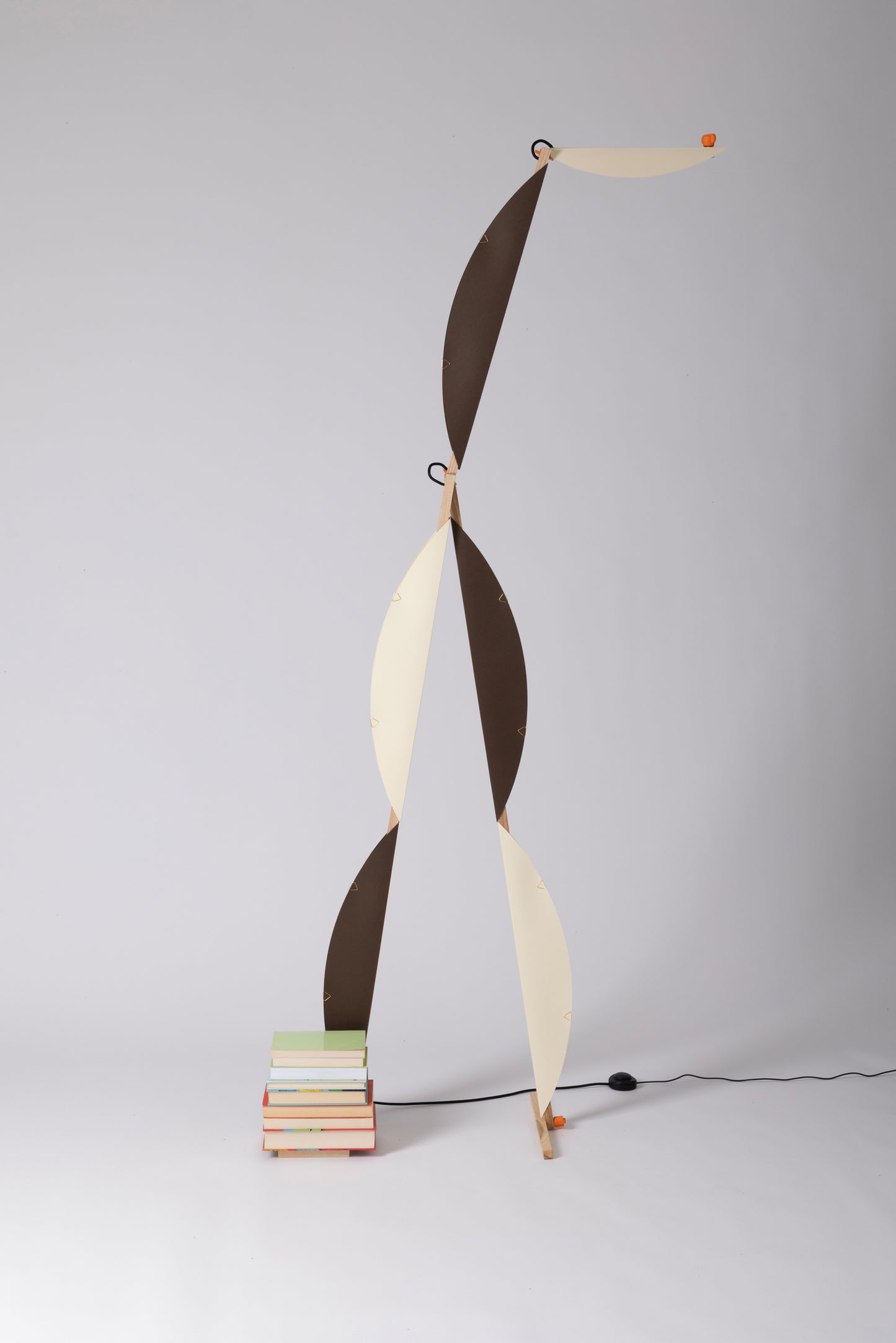 A floor lamp with HALFMOON shade and add-ons
