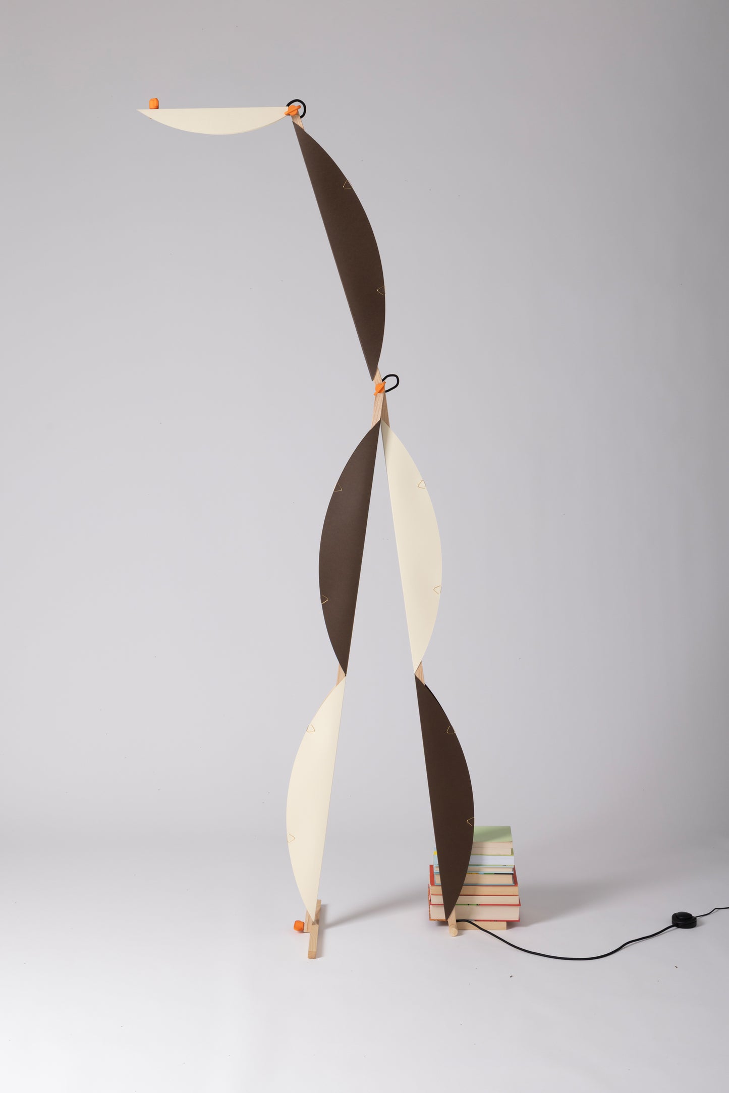 A floor lamp with HALFMOON shade and add-ons