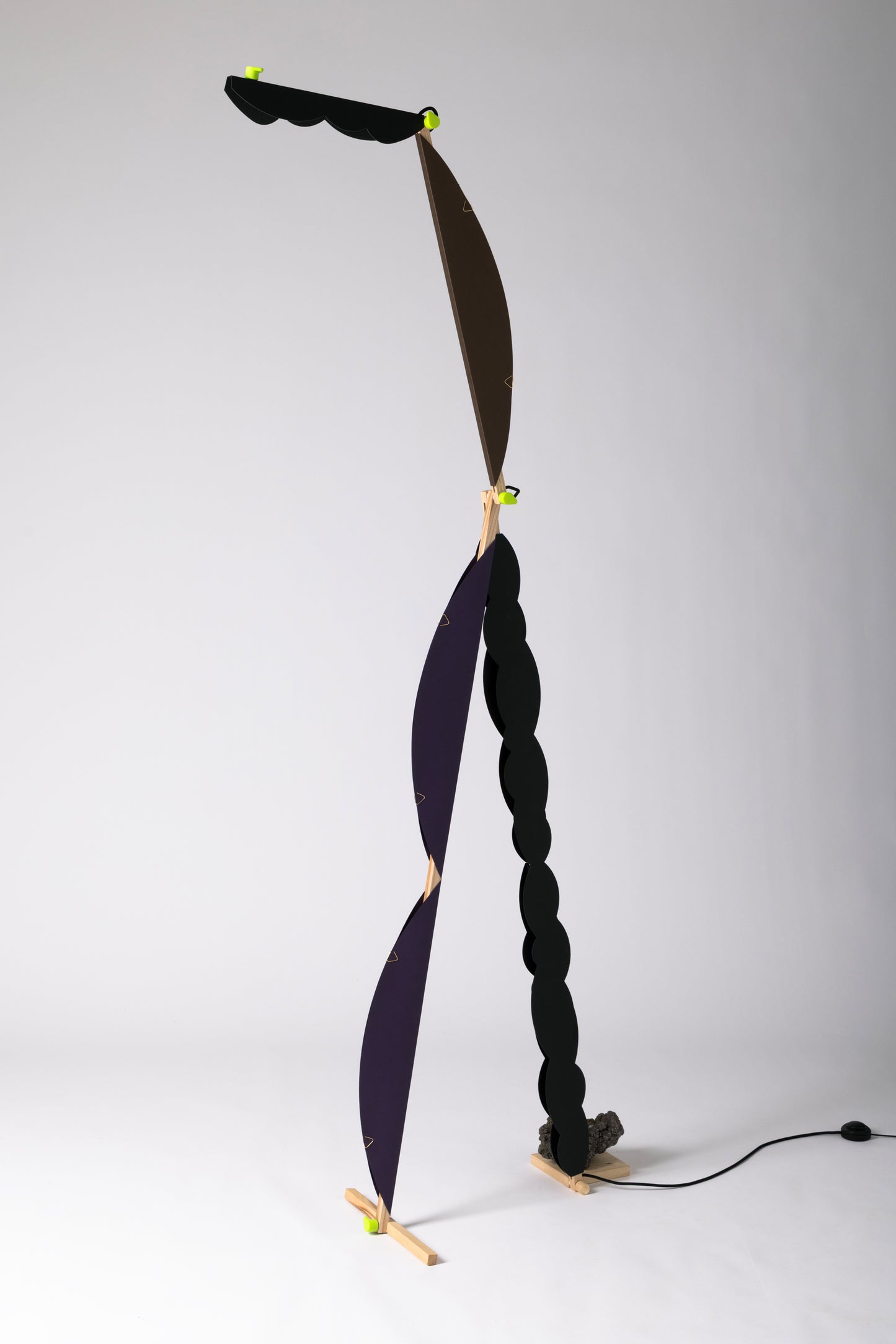 A floor lamp with HALFMOON add-ons & BLIP add-ons and shade