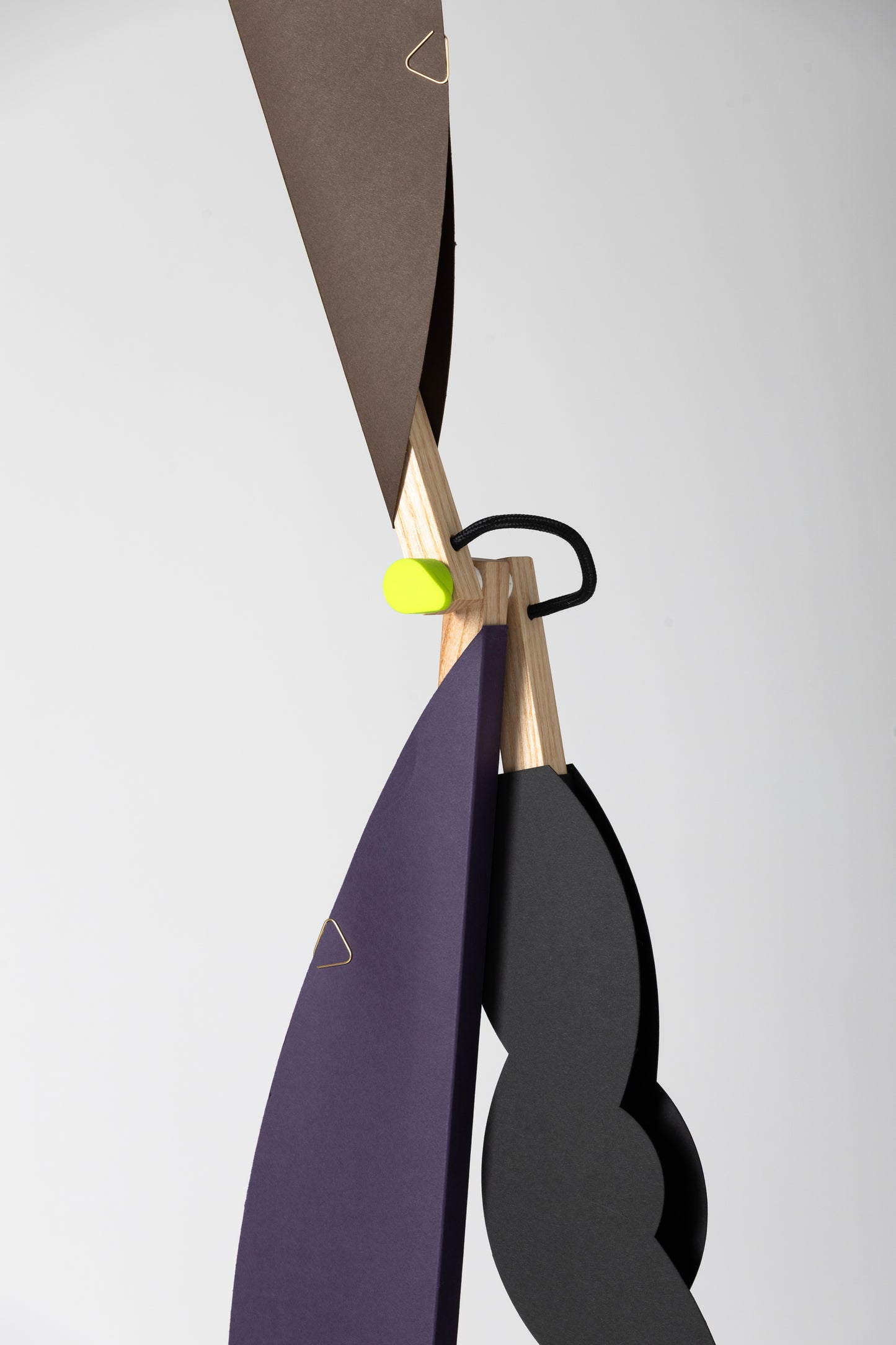 A floor lamp with HALFMOON add-ons & BLIP add-ons and shade