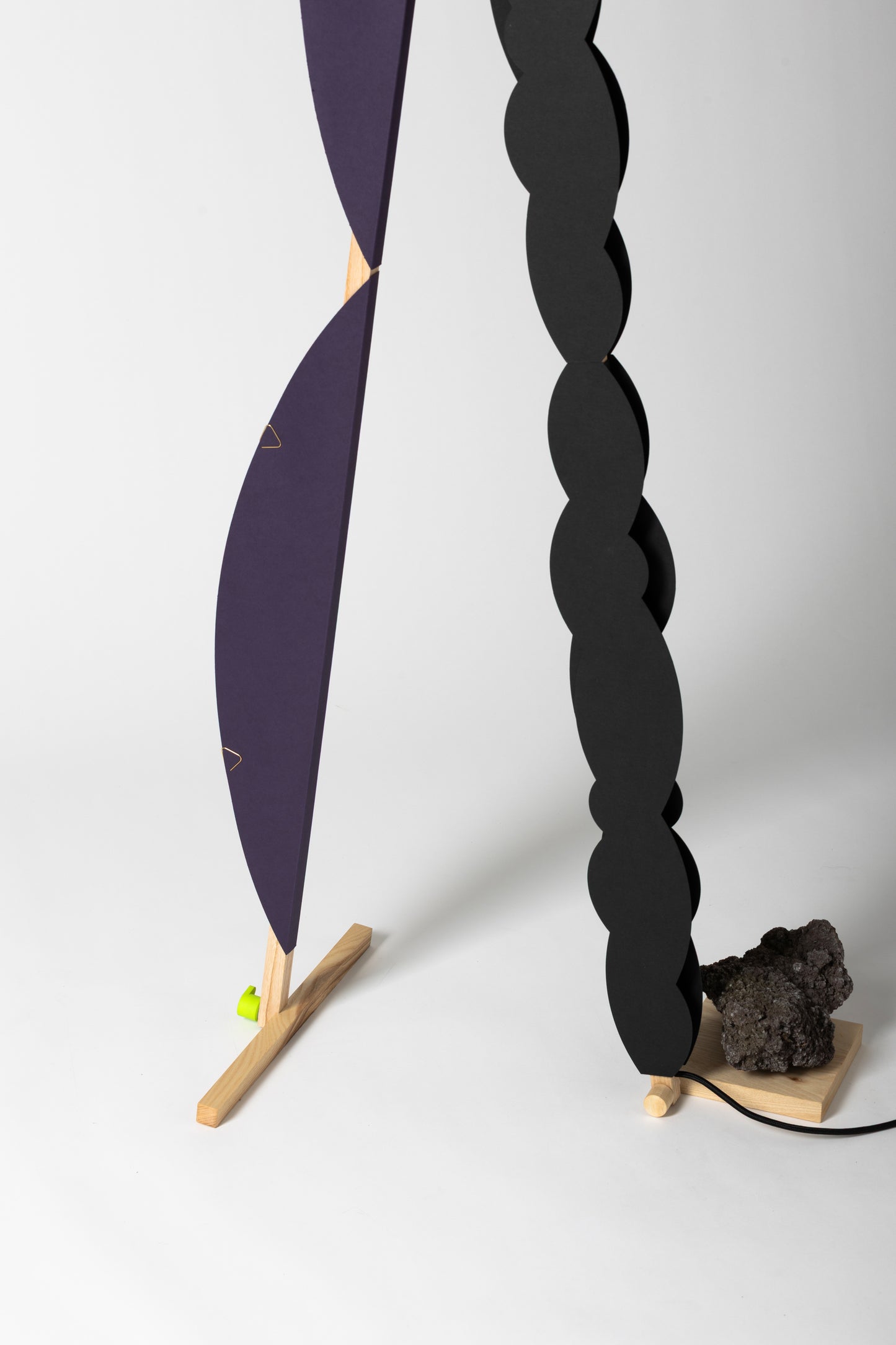 A floor lamp with HALFMOON add-ons & BLIP add-ons and shade