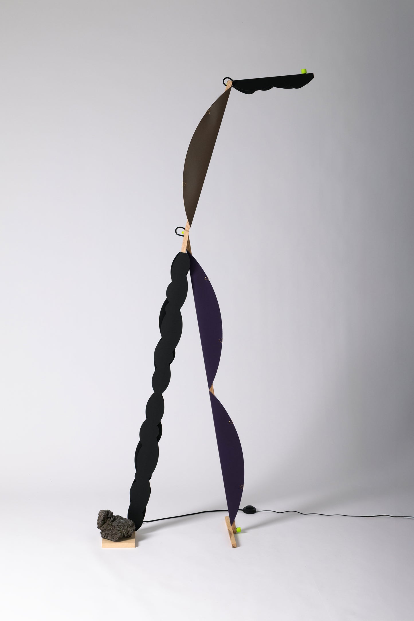 A floor lamp with HALFMOON add-ons & BLIP add-ons and shade