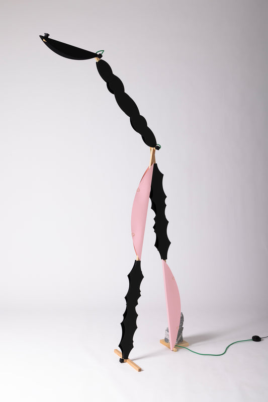 A floor lamp with HALFMOON add-ons and shade & BLIP add-on & DIP add-ons
