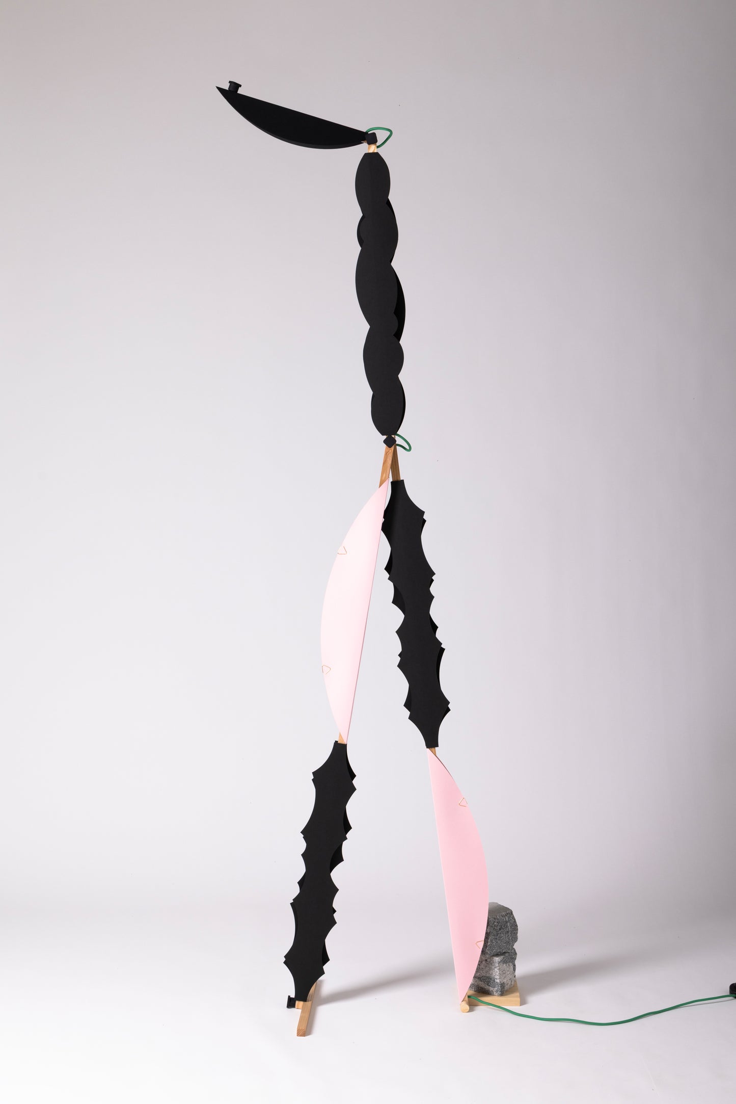 A floor lamp with HALFMOON add-ons and shade & BLIP add-on & DIP add-ons