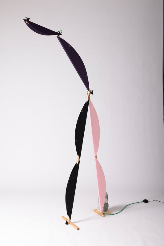 A floor lamp with HALFMOON add-ons