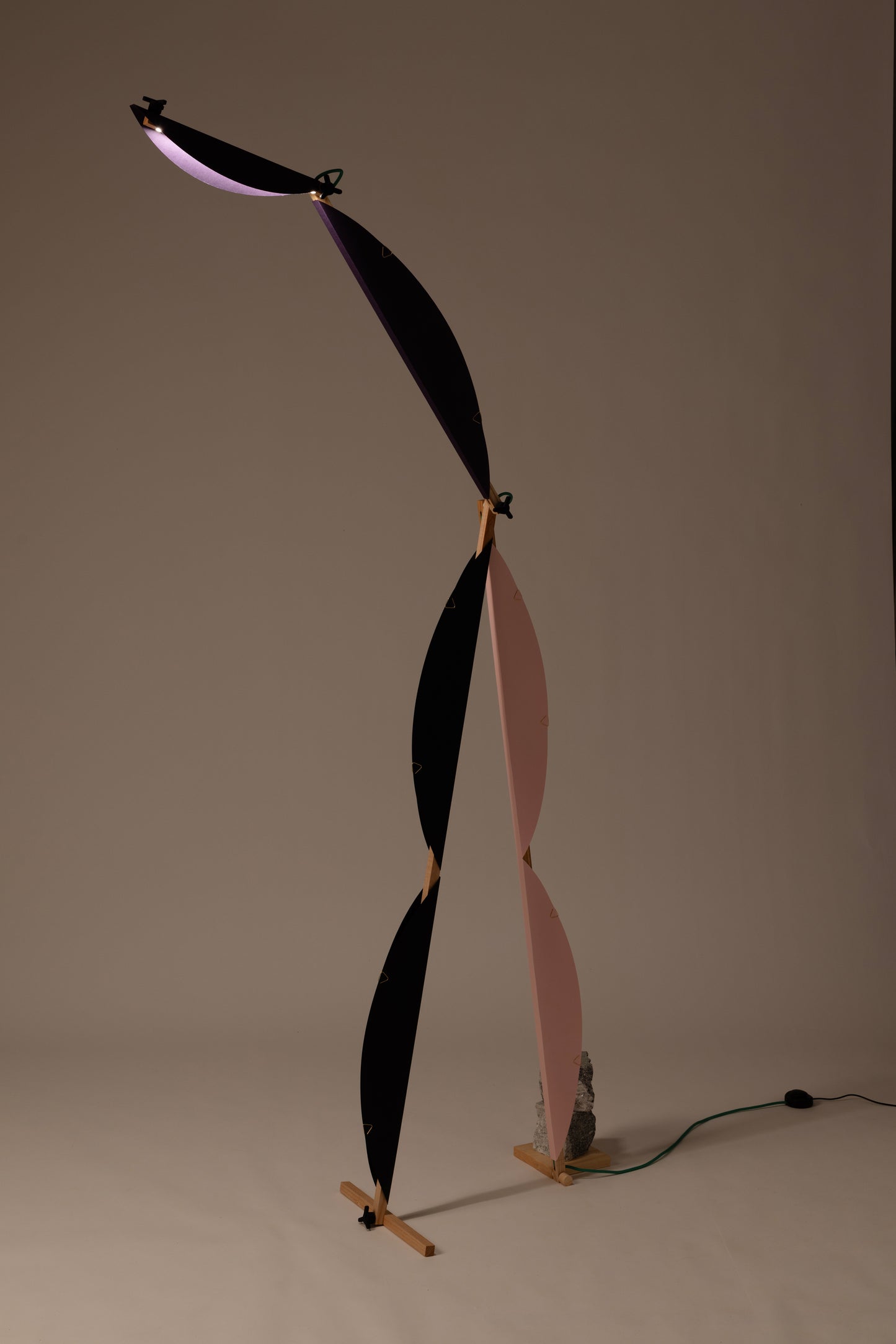 A floor lamp with HALFMOON add-ons