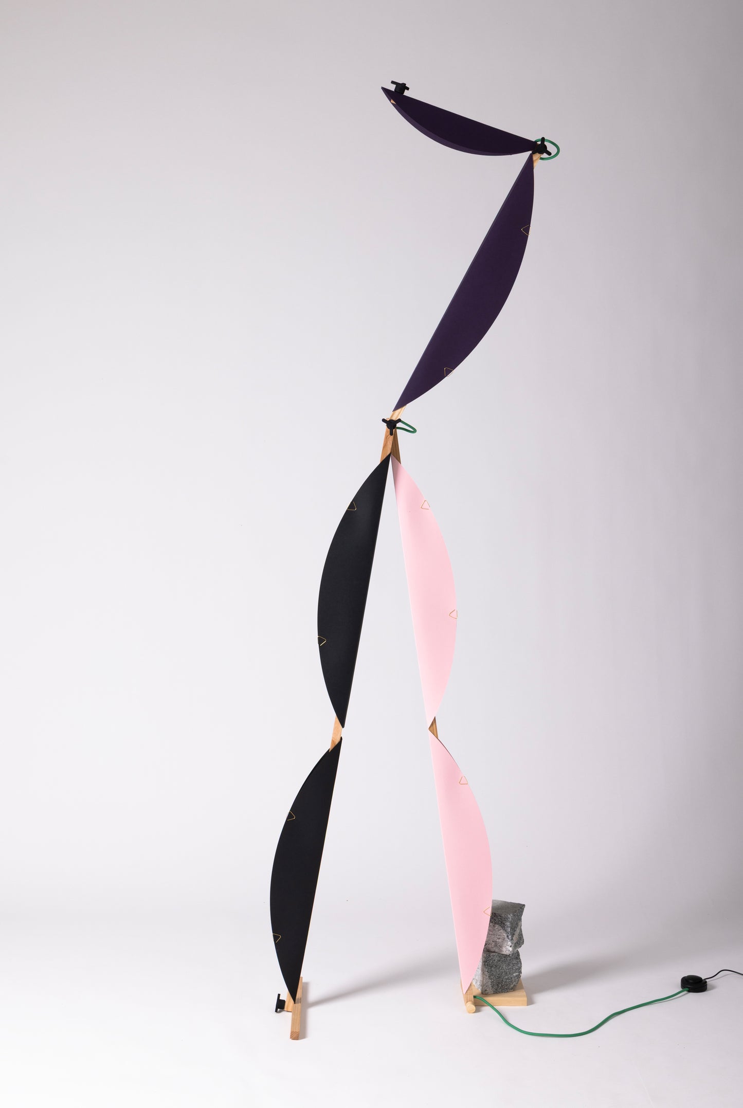 A floor lamp with HALFMOON add-ons