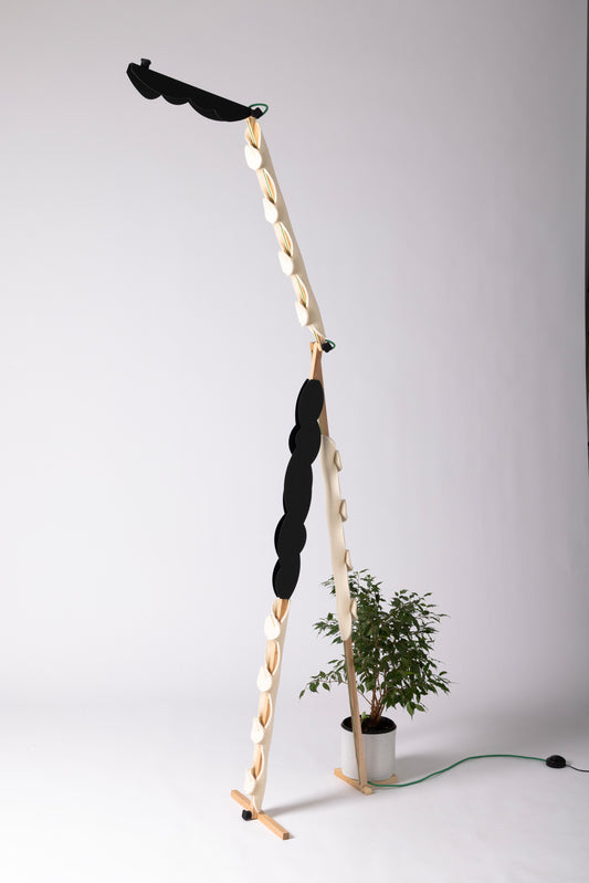 A floor lamp with OLOP sleeve & BLIP add-on and shade