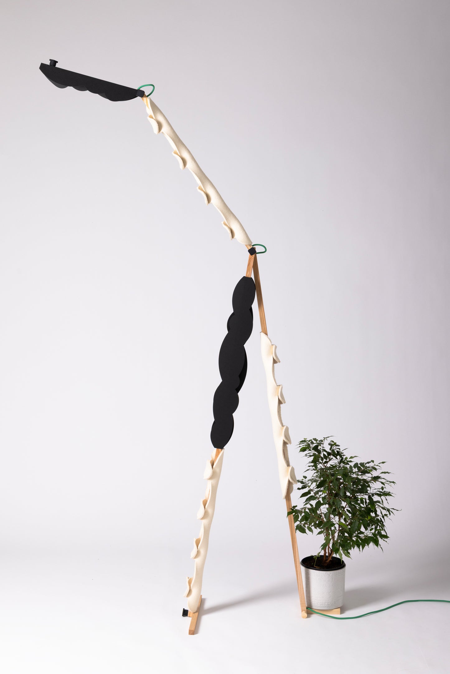 A floor lamp with OLOP sleeve & BLIP add-on and shade